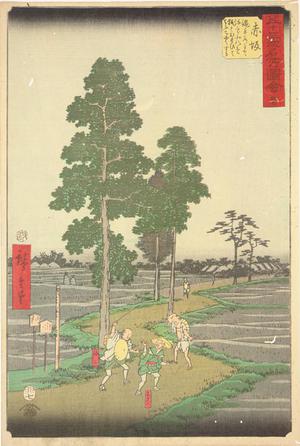 Utagawa Hiroshige: Yajiro Mistakes Kitahachi for a Fox and Beats him on the Nawate Road near Akasaka, no. 37 from the series Pictures of the Famous Places on the Fifty-three Stations (Vertical Tokaido) - University of Wisconsin-Madison