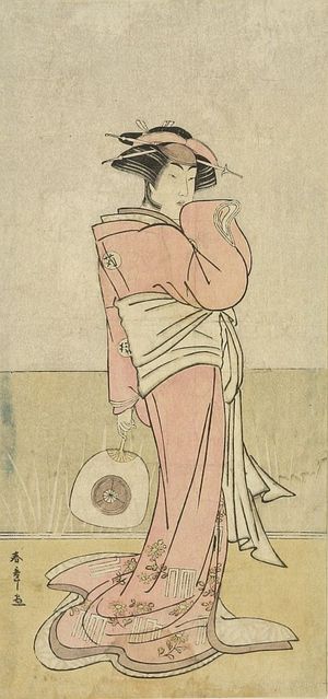 Katsukawa Shunsho: Actor Iwai Hanshirô 4th AS A WOMAN WEARING A PINK KIMONO AND HOLDING A FAN, Edo period, 1776 - Harvard Art Museum