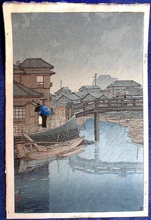 川瀬巴水: Rainy Season at Ryoshimachi, Shinagawa - Japanese Art Open Database